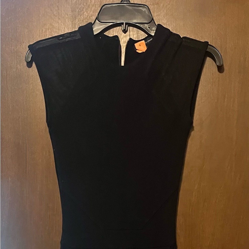 French Connection Black Jumpsuit with sheer short sleeves with side pockets.